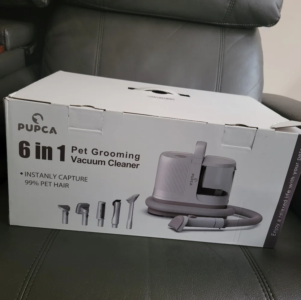 Pet grooming vacuum